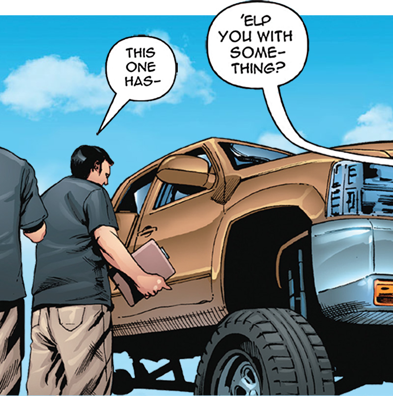 Man examines brown truck tires before owner interrupts.