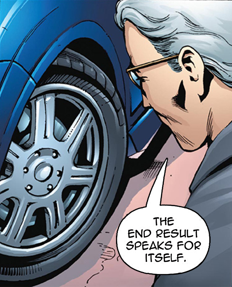 Two people inspect red car tire closely.